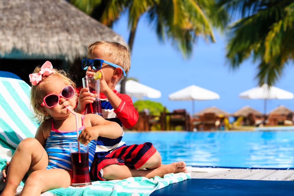 Vacanze con bambini nei paesi esotici: consigli contro i colpi di sole